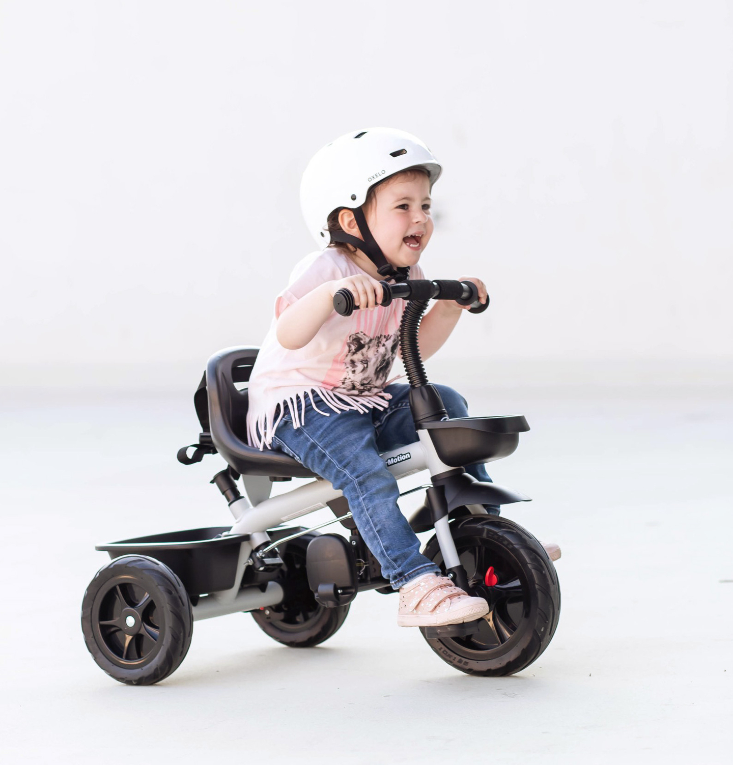 Tricicleta HyperMotion TOBI VECTOR - roți gonflabile veșnice + bară de împingere. Culoare: gri deschis.