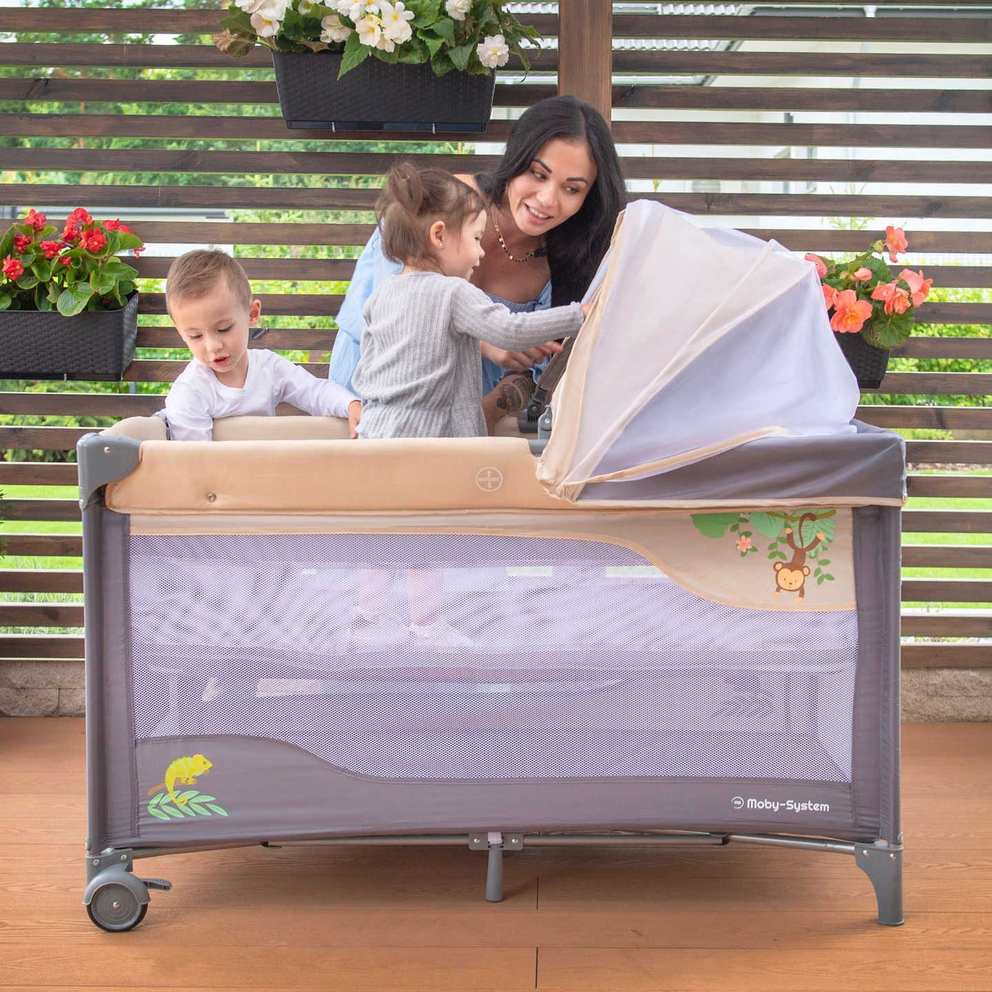 Patut de voiaj 0 - 36 m cu masuta de infasat + Sistem Moby-Sistem HUXLEY