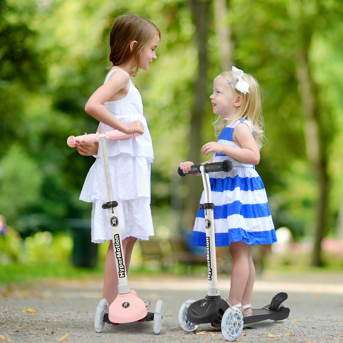 Trotineta cu echilibru cu trei roți TRINGO, 3-8 ani - roz + roți LED strălucitoare