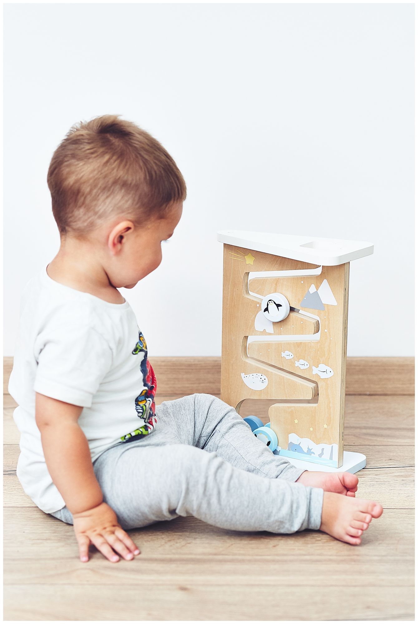 Tablă de manipulare senzorială din lemn cu două fețe