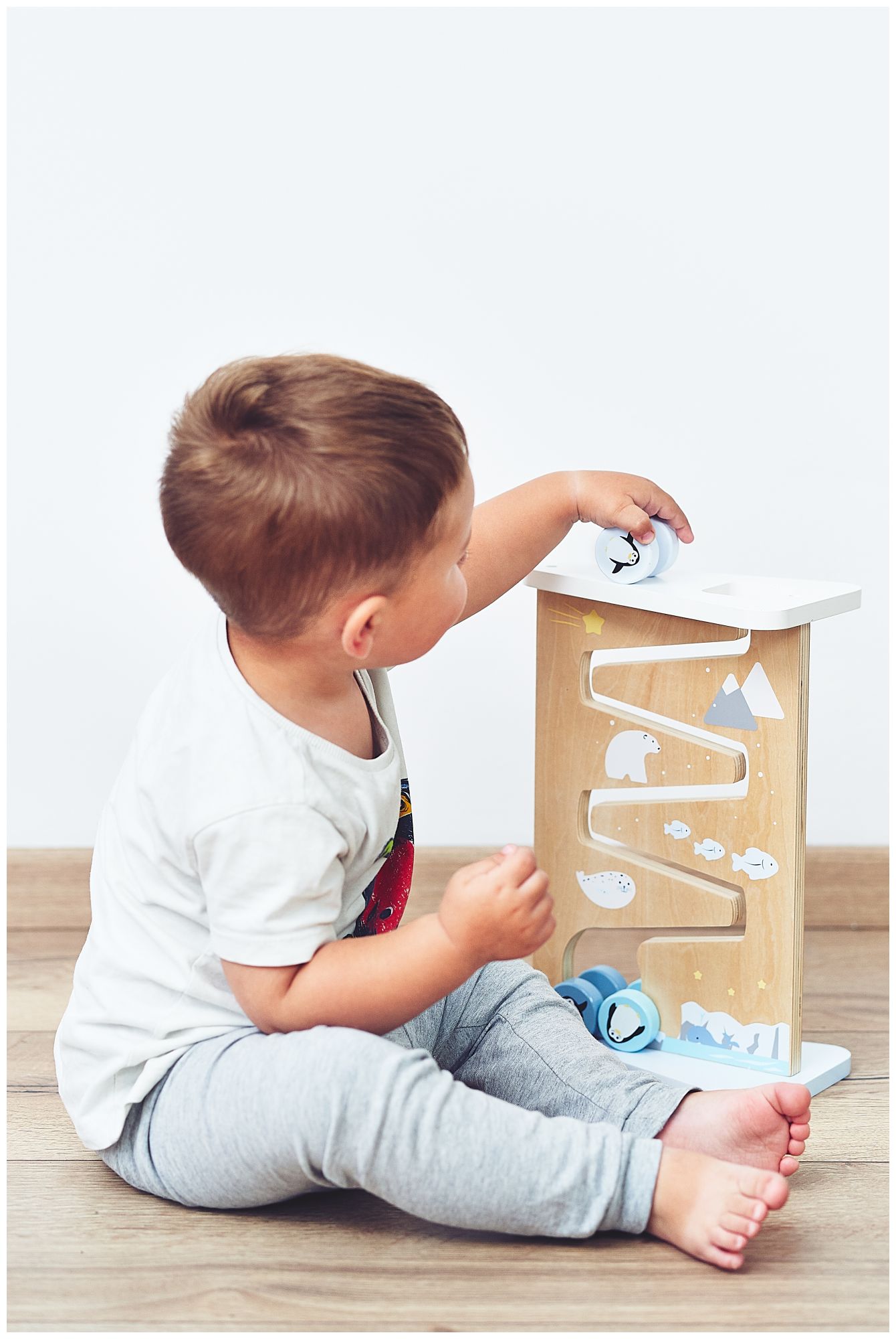 Tablă de manipulare senzorială din lemn cu două fețe